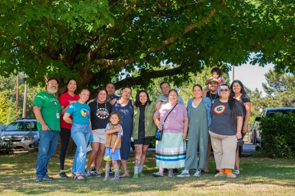 Community members gathered outdoors at Barbie's Village